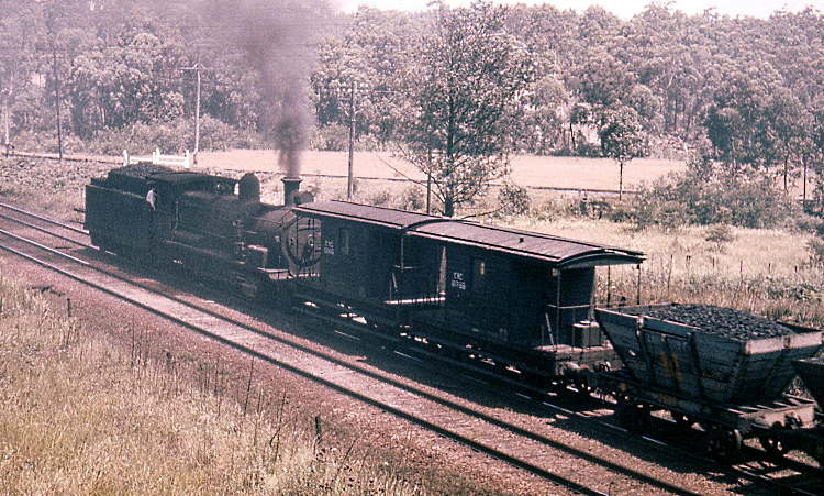 5486 pushing hard on the buffers of an up coal train from Newstan Colliery